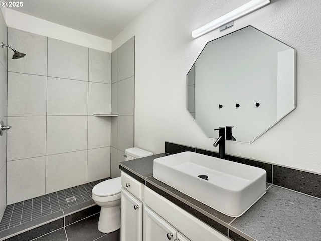 1916 SW 6th St, Battle Ground, WA 98604 - full bathroom with a tile shower, vanity, and tile patterned floors