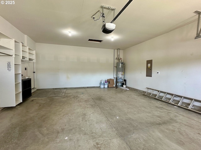 1916 SW 6th St, Battle Ground, WA 98604 - garage featuring electric panel, strapped water heater, and a garage door opener
