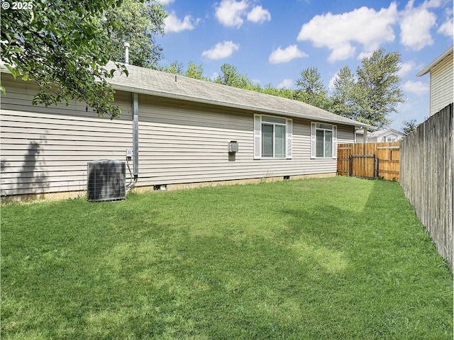 1916 SW 6th St, Battle Ground, WA 98604 - back of house with crawl space, a fenced backyard, and a shingled roof