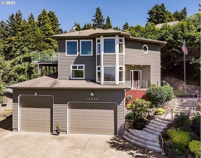 35445 Topping Rd, Pacific City, OR 97135 - view of front facade with an attached garage, driveway, and stairs