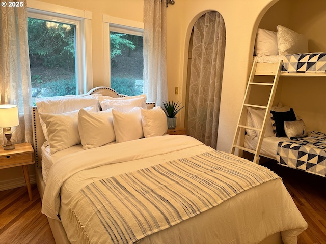 bedroom with wood finished floors