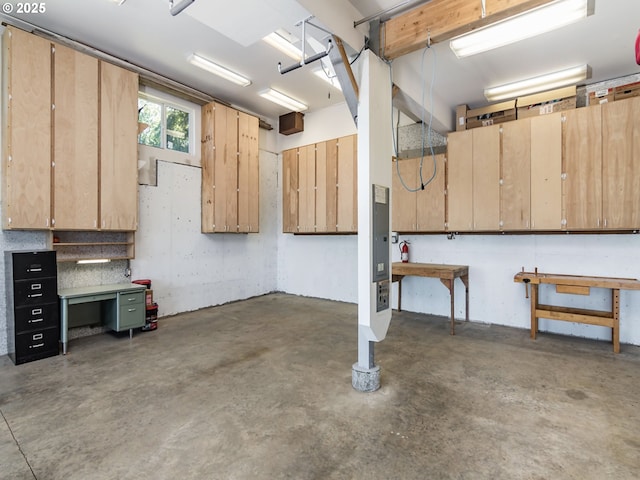 35445 Topping Rd, Pacific City, OR 97135 - garage featuring a workshop area