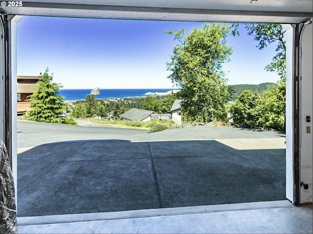 view of patio / terrace with a water view