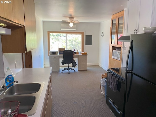 1223 NE Locust St, Oakland, OR 97462 - kitchen featuring black appliances, a sink, a wall unit AC, an office area, and carpet floors