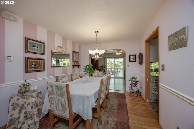 4405 NE 29th Ave, Vancouver, WA 98663 - dining space with wood finished floors, a chandelier, and a textured ceiling