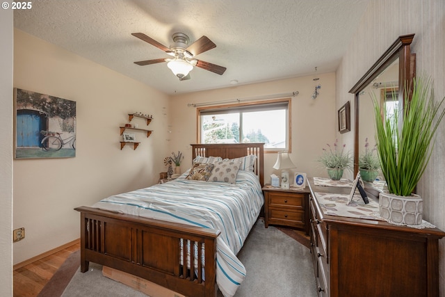 4405 NE 29th Ave, Vancouver, WA 98663 - bedroom with a textured ceiling, a ceiling fan, and light wood-style floors