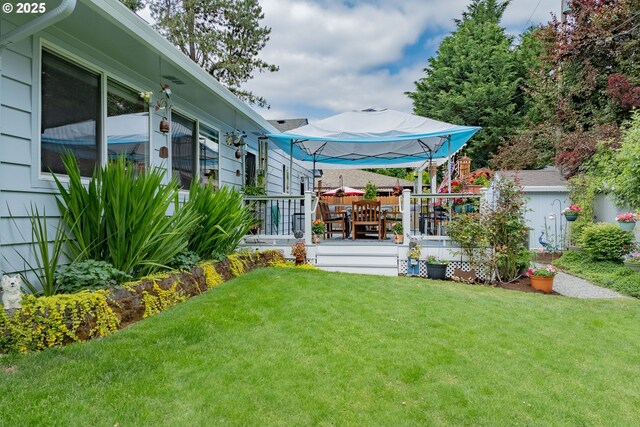 4405 NE 29th Ave, Vancouver, WA 98663 - view of grassy yard with a wooden deck