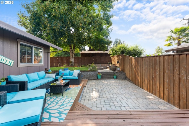 229 N 6th St, Carlton, OR 97111 - wooden terrace with an outdoor hangout area, a fenced backyard, and a patio