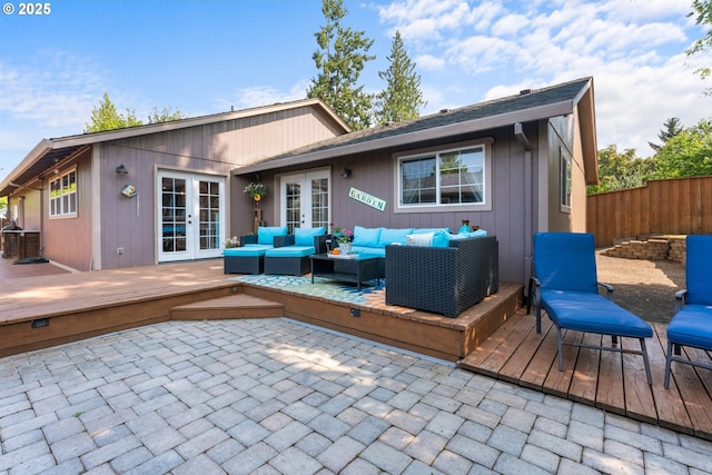 229 N 6th St, Carlton, OR 97111 - back of property with french doors, a deck, and an outdoor living space
