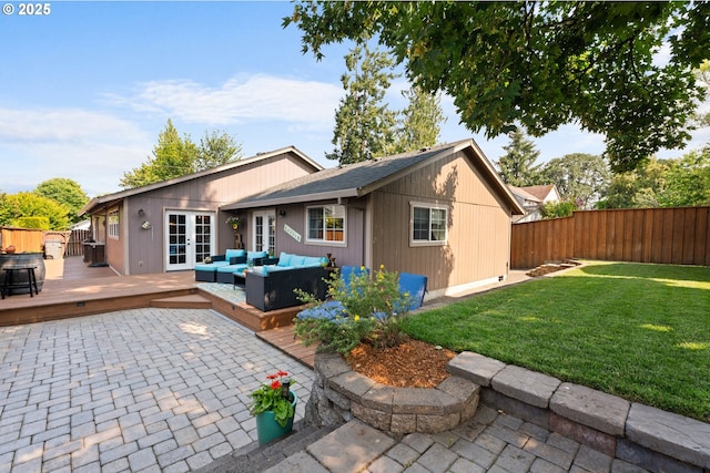 229 N 6th St, Carlton, OR 97111 - rear view of house with french doors, an outdoor hangout area, a deck, and a fenced backyard