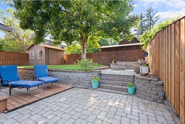 229 N 6th St, Carlton, OR 97111 - fenced backyard featuring a patio area and a storage shed