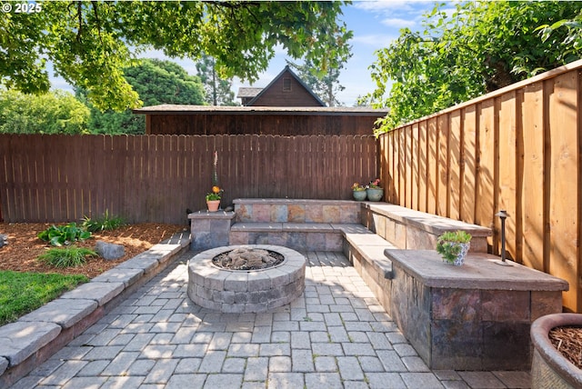 229 N 6th St, Carlton, OR 97111 - fenced backyard with an outdoor fire pit and a patio area