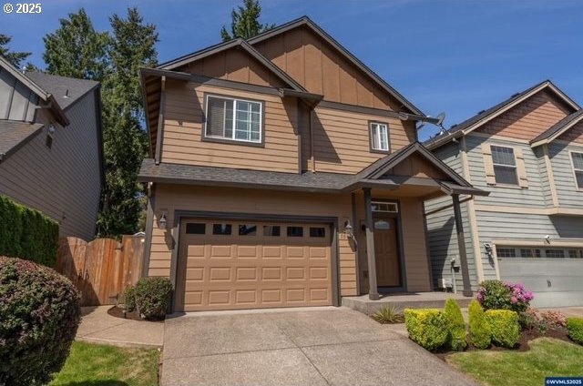 5065 SW 207th Pl, Beaverton, OR 97078 - craftsman inspired home with an attached garage, board and batten siding, and concrete driveway