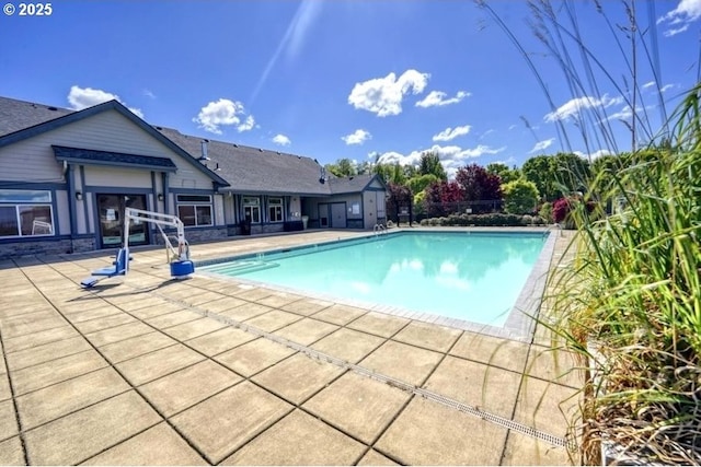 view of pool featuring a patio and a fenced in pool