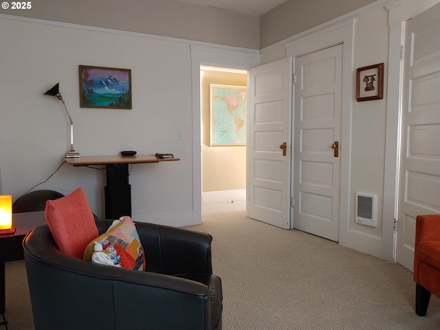 2127 NW Irving St # 202, Portland, OR 97210 - carpeted living room with heating unit and baseboards