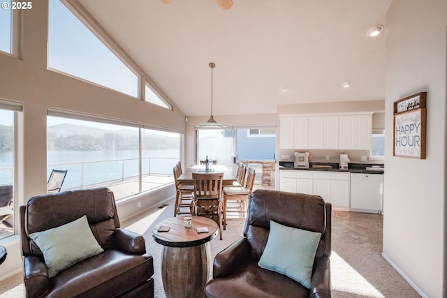 1508 NE Lake Dr, Lincoln City, OR 97367 - living room featuring light colored carpet and high vaulted ceiling