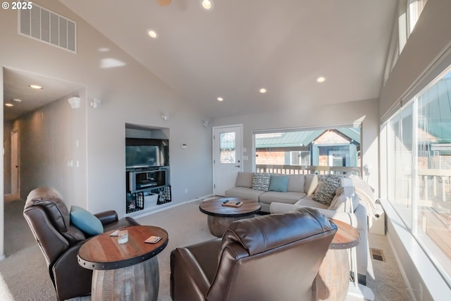 1508 NE Lake Dr, Lincoln City, OR 97367 - carpeted living room featuring high vaulted ceiling