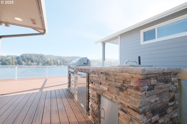 1508 NE Lake Dr, Lincoln City, OR 97367 - dock area with exterior kitchen, a water view, and exterior bar