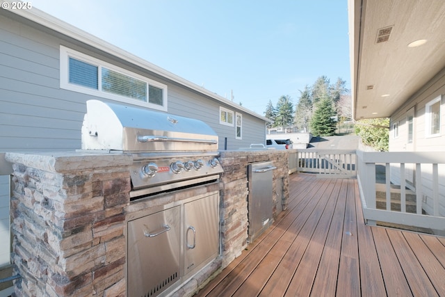 1508 NE Lake Dr, Lincoln City, OR 97367 - wooden terrace with exterior kitchen and a grill