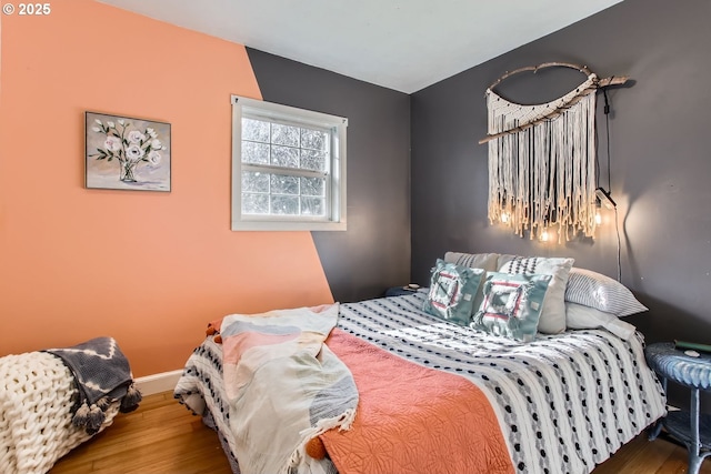 bedroom featuring hardwood / wood-style flooring