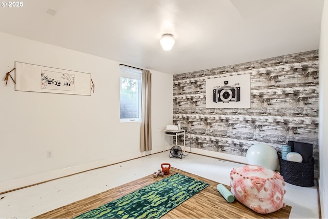 living area with hardwood / wood-style flooring