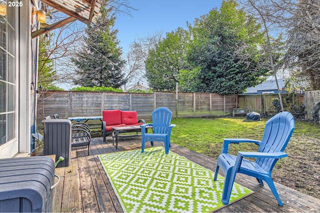 deck with a yard and an outdoor hangout area