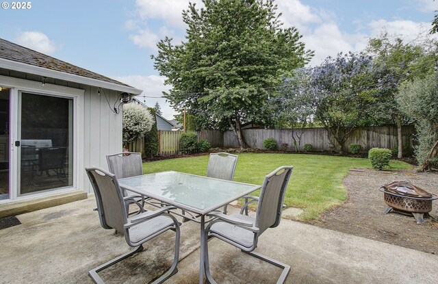 7716 NE 136th Ave, Vancouver, WA 98682 - view of patio featuring outdoor dining space and a fire pit