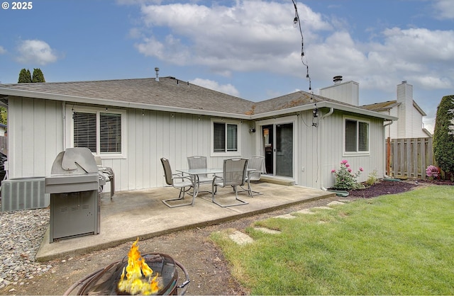 7716 NE 136th Ave, Vancouver, WA 98682 - back of house with an outdoor fire pit, a patio, roof with shingles, a chimney, and cooling unit
