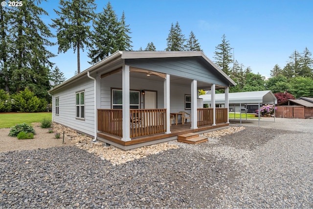 view of front of home with a carport