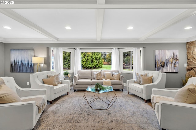 living room featuring crown molding, beam ceiling, and plenty of natural light