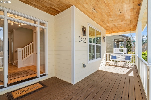 wooden deck featuring a porch