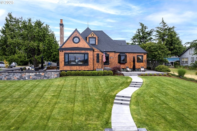 7506 SE Evergreen Hwy, Vancouver, WA 98664 - view of front of property with a chimney, a front lawn, and roof with shingles
