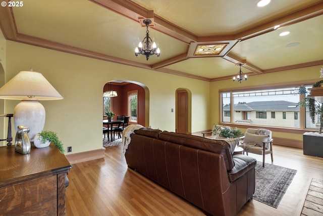 7506 SE Evergreen Hwy, Vancouver, WA 98664 - living area with arched walkways, a chandelier, light wood finished floors, recessed lighting, and crown molding
