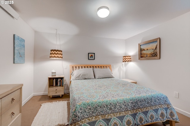 bedroom featuring baseboards