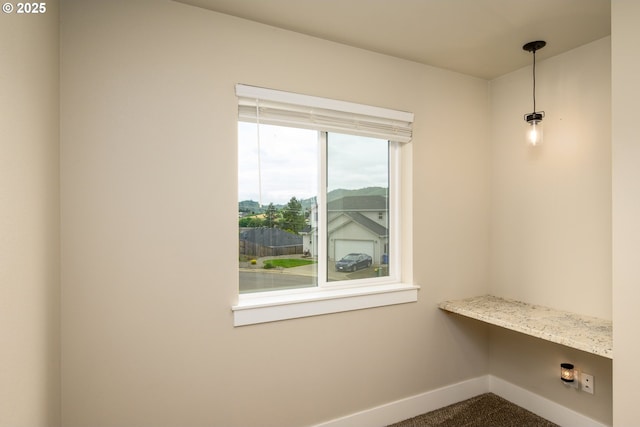 625 Brady Ln, Roseburg, OR 97471 - laundry area with baseboards and dark colored carpet