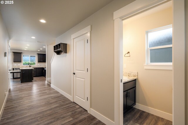 625 Brady Ln, Roseburg, OR 97471 - hall with dark wood-style floors, recessed lighting, and baseboards
