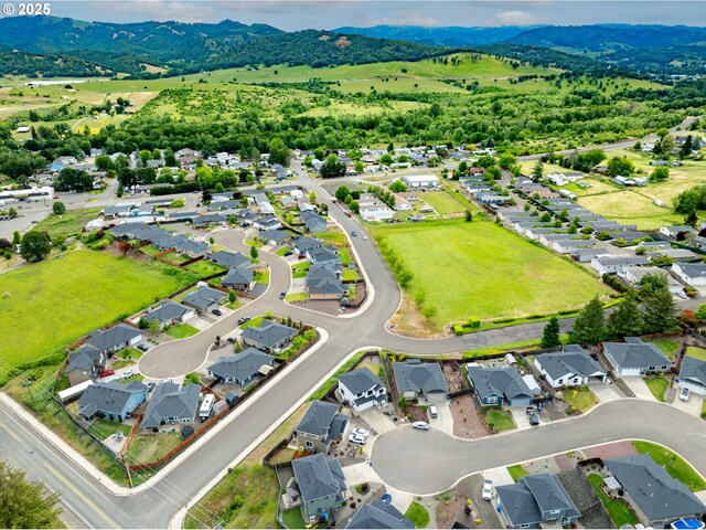 625 Brady Ln, Roseburg, OR 97471 - aerial view of residential area with a mountain backdrop