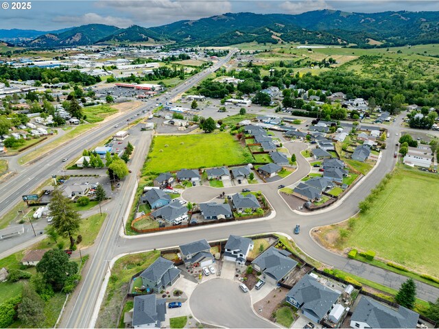 625 Brady Ln, Roseburg, OR 97471 - aerial view of property and surrounding area with a mountainous background and nearby suburban area