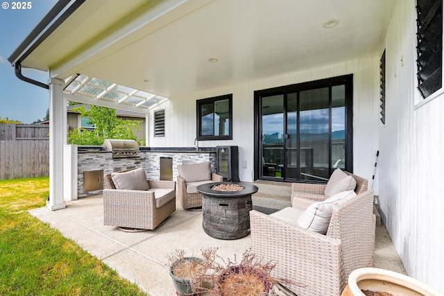 625 Brady Ln, Roseburg, OR 97471 - view of patio featuring a sink and an outdoor living space with a fire pit
