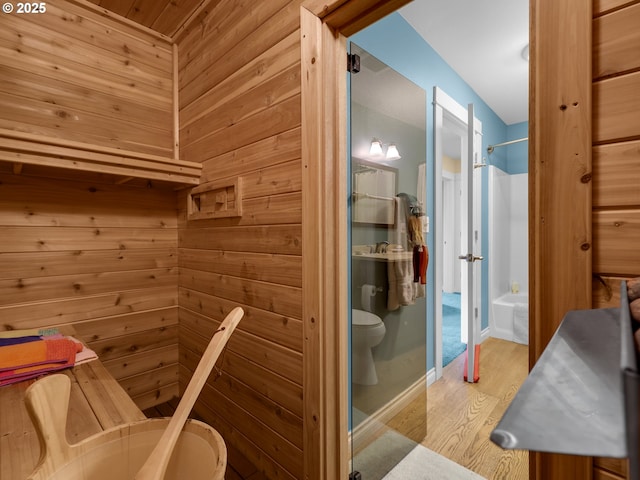 view of sauna / steam room featuring wood finished floors