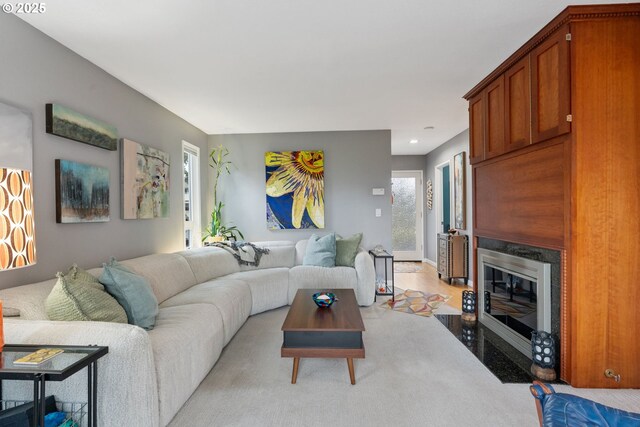 kitchen featuring sink, appliances with stainless steel finishes, tasteful backsplash, washer / clothes dryer, and light wood-type flooring