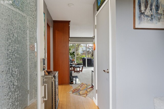 corridor featuring light hardwood / wood-style flooring