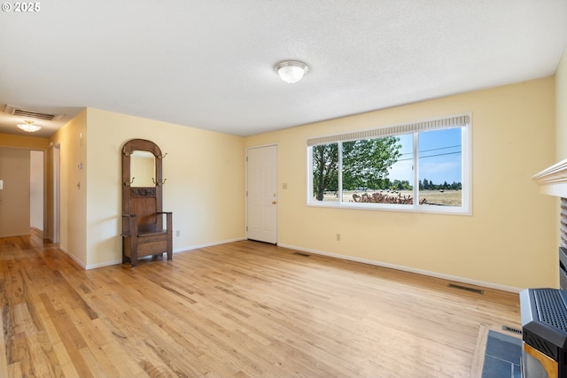 5425 SW Willow Ave, Corvallis, OR 97333 - unfurnished living room with light wood-type flooring