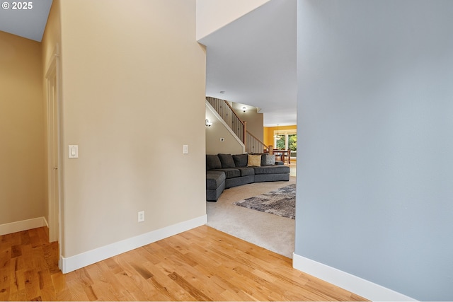 14386 NW Tripton Ct, Beaverton, OR 97006 - entrance foyer featuring stairs and light wood-style floors