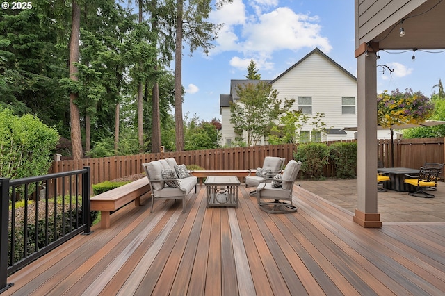 14386 NW Tripton Ct, Beaverton, OR 97006 - wooden deck featuring an outdoor living space and a fenced backyard