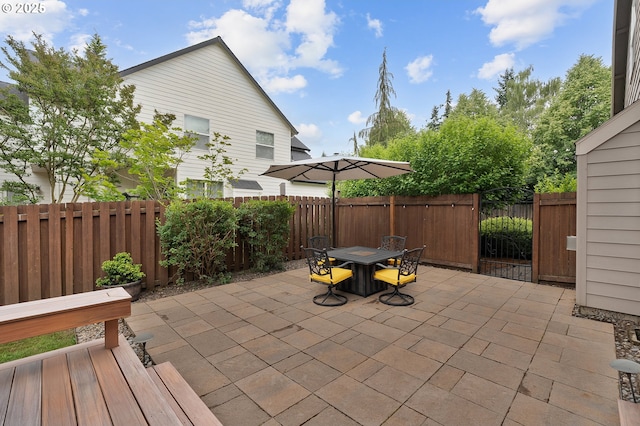 14386 NW Tripton Ct, Beaverton, OR 97006 - view of patio / terrace featuring outdoor dining area