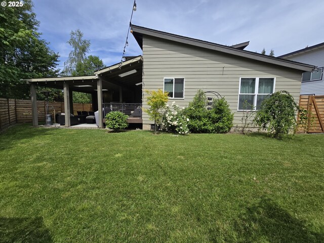202 NW Quail Gardens Pl, Hillsboro, OR 97124 - rear view of property with a patio and an outdoor living space
