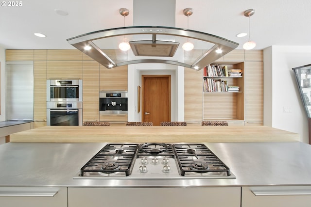 kitchen featuring stainless steel counters, recessed lighting, stainless steel appliances, decorative backsplash, and modern cabinets