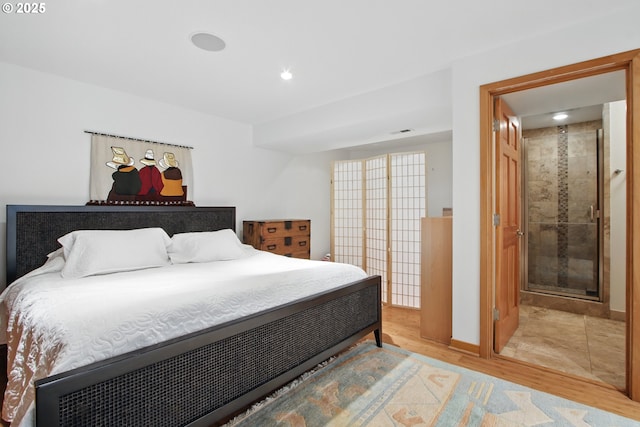 bedroom with recessed lighting, baseboards, and light wood finished floors