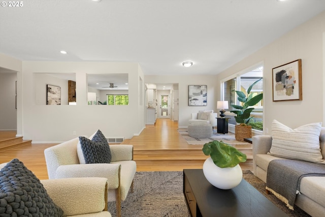 2395 SW Timberline Dr, Portland, OR 97225 - living room featuring light wood-style flooring, a ceiling fan, recessed lighting, and baseboards